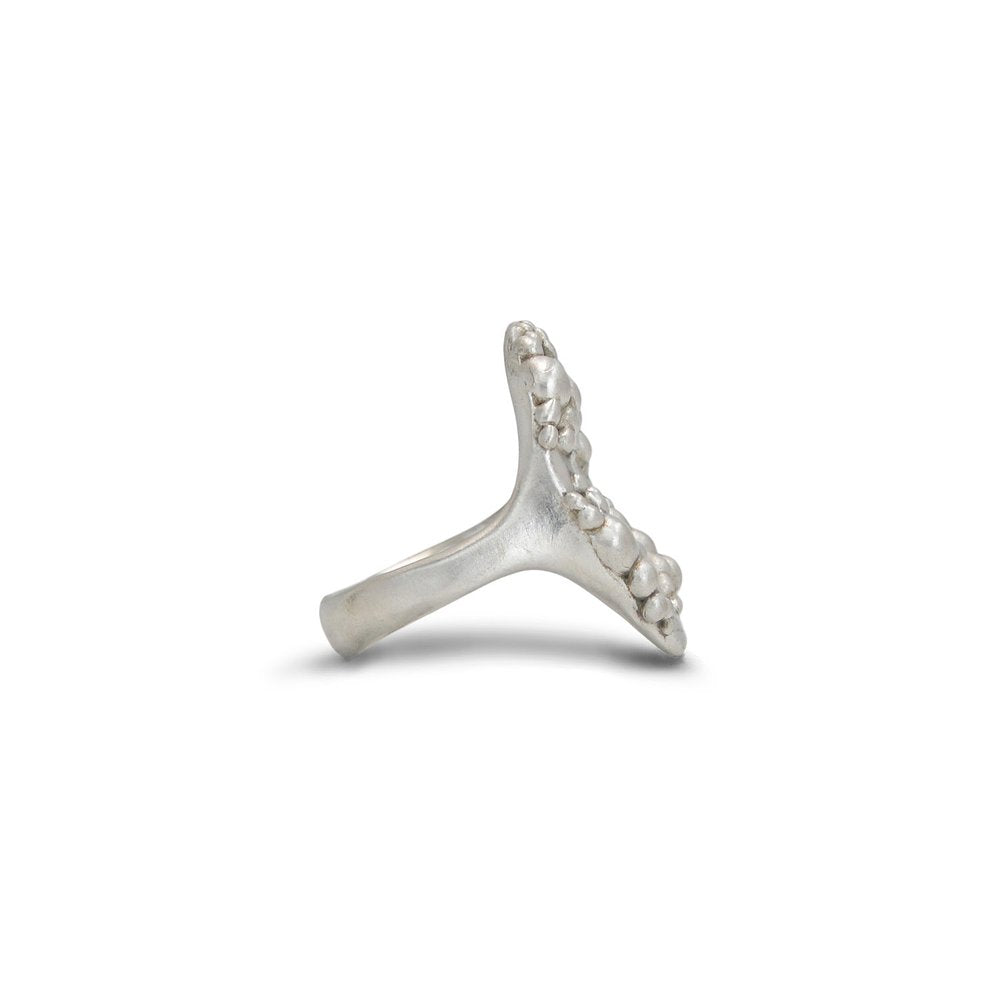 Side view of Shaya Durbin's Cluster Circle Ring showing the sculptural open circle, textured silver clusters and distinctive raised ring construction.