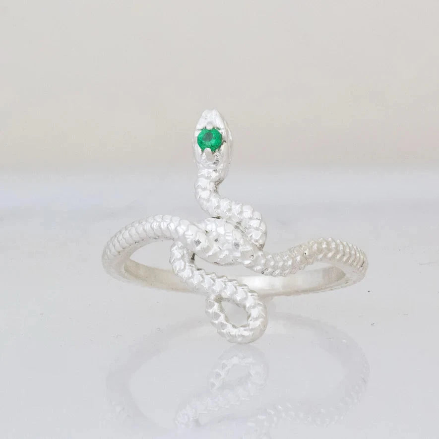 Alternate view of the sterling silver Snake Guardian Ring showing the serpent's coiled body and green emerald head detail.