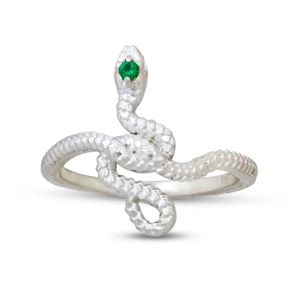 Snake Guardian Ring by Michaela Farkasovska featuring a sculptural sterling silver snake wrapped around the finger with a green Zambian emerald set in its head.