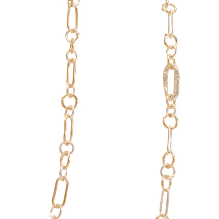 Close-up of the handcrafted mixed-metal chain featuring alternating 14k yellow gold and sterling silver links, designed for the Square Fragmented Pendant.