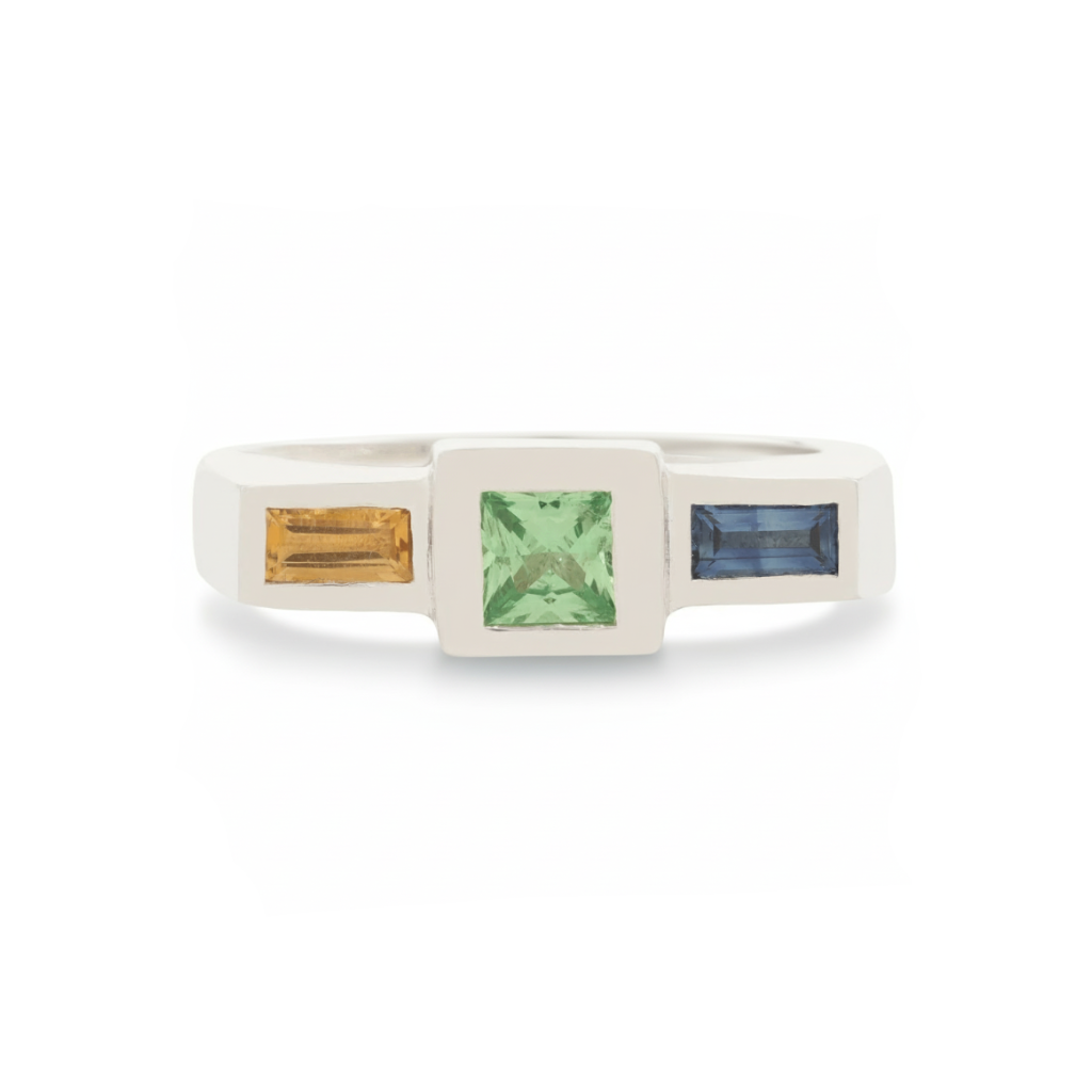 Sterling silver signet ring with a green tsavorite center stone and baguette-cut citrine and blue sapphire side stones.