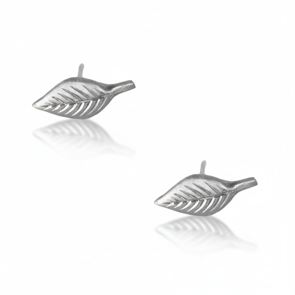 Sterling silver leaf-shaped stud earrings displayed on a white background.