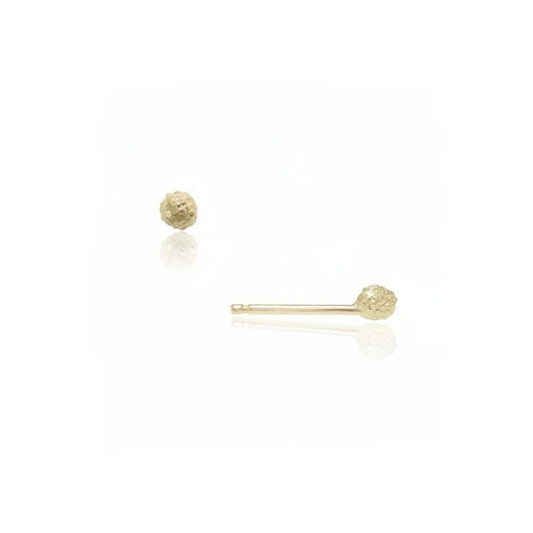 Front and side views of the Stigma Stud Earrings by Alexis Pavlantos in solid 14k yellow gold, featuring a petite 4mm floral center design with organic hand-carved texture.