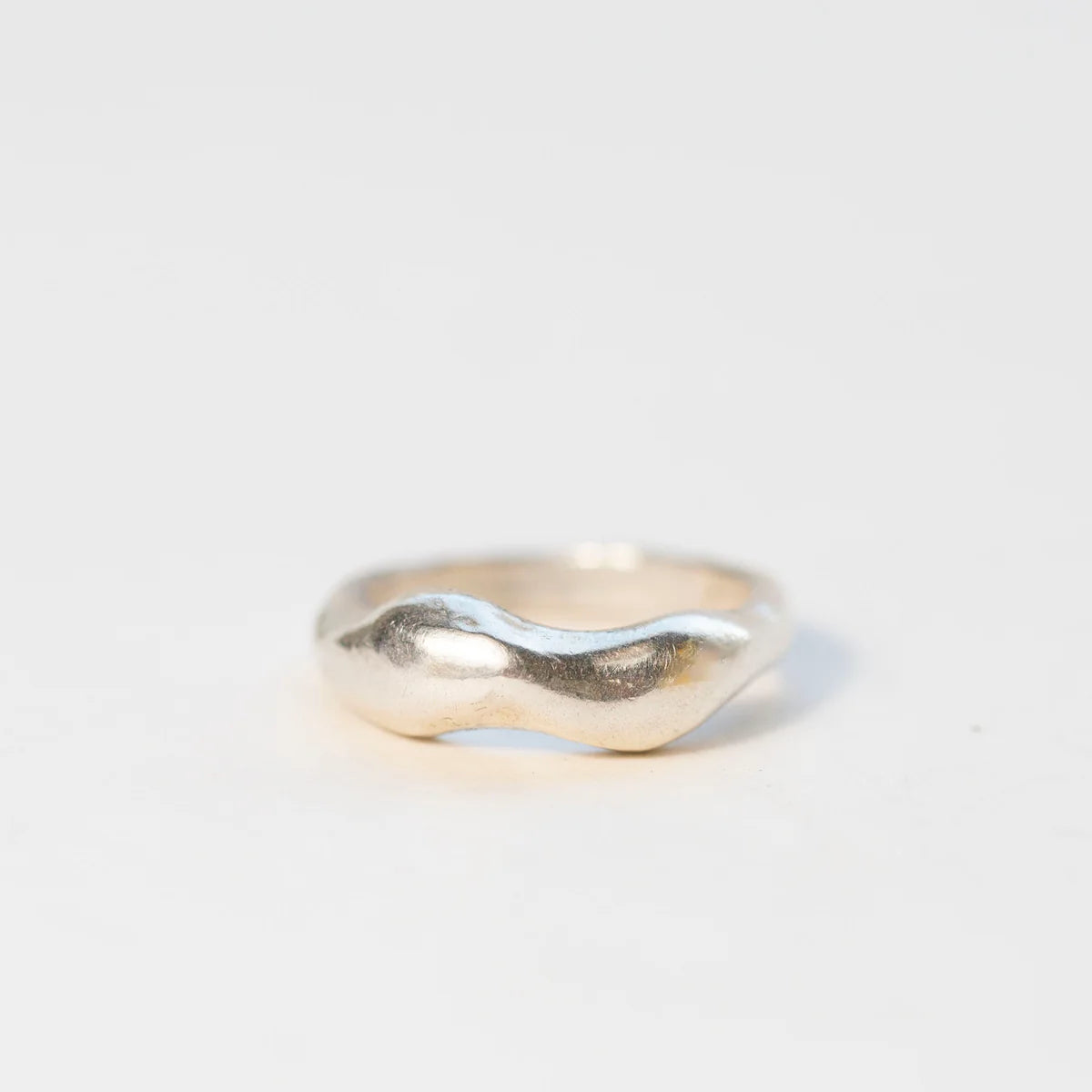 Tides Ring crafted in solid sterling silver displayed in front view.