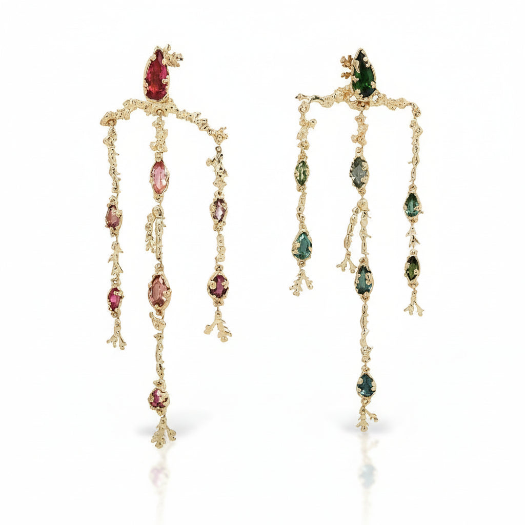 Front view of one-of-a-kind Tourmaline Coral Chandelier Earrings by Alexis Pavlantos, featuring hand-carved recycled 14k yellow gold and pink and green tourmalines in an asymmetrical coral-inspired design.