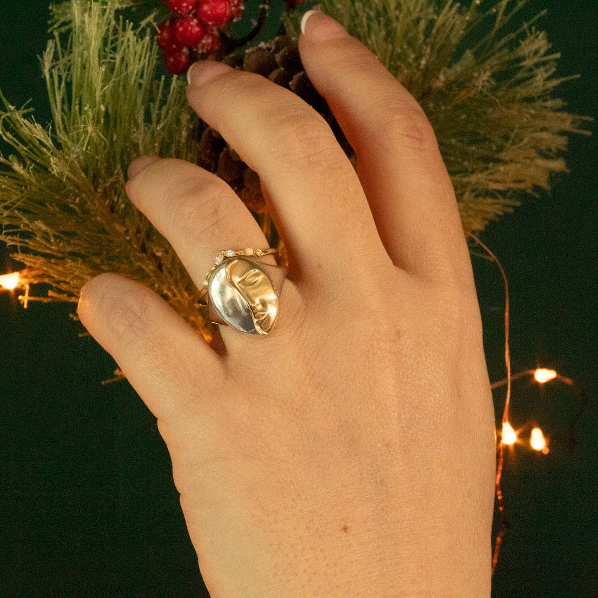 Truth Mixed Metal Ring worn with other artisan rings, showcasing its statement size and mixed-metal craftsmanship.