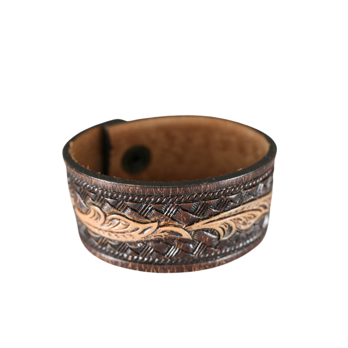 Handmade vintage brown leather cuff bracelet with geometric tooling, decorative borders, and a naturally aged finish.
