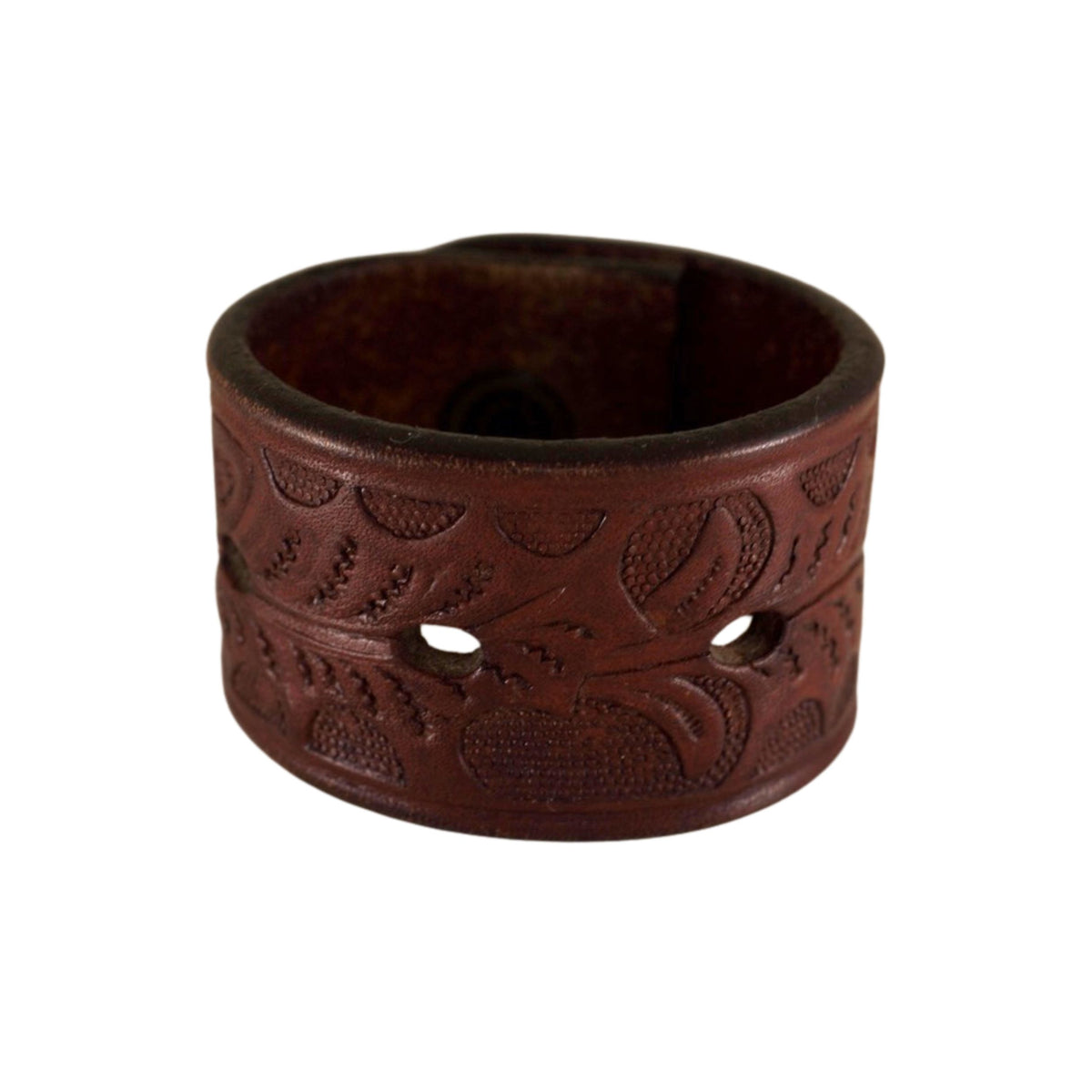 Handmade burgundy leather cuff bracelet featuring embossed floral motifs and a rich, distressed vintage finish.