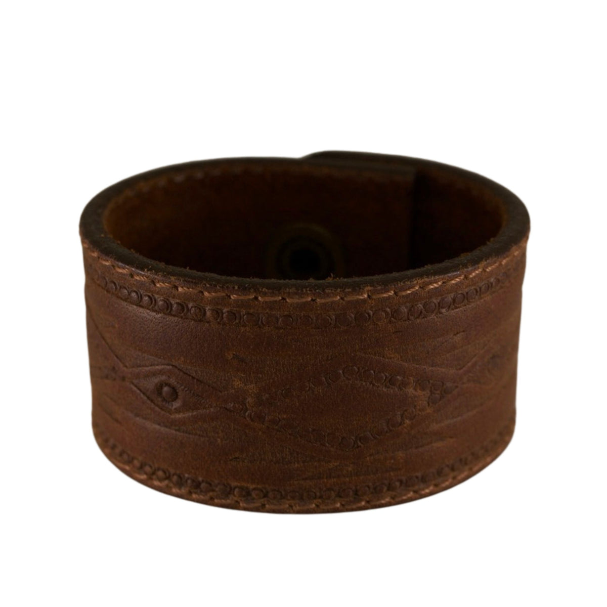 Wide vintage dark brown leather cuff bracelet with subtle embossed details and a naturally aged finish by Kelly Horrigan Handmade.