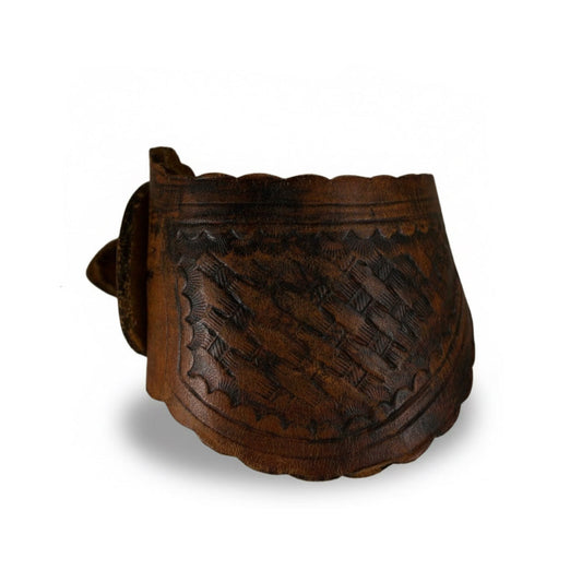 Handmade vintage spur leather cuff bracelet by Kelly Horrigan featuring repurposed dark brown leather, intricate hand-tooled patterns, scalloped edges, and rustic Western detailing.