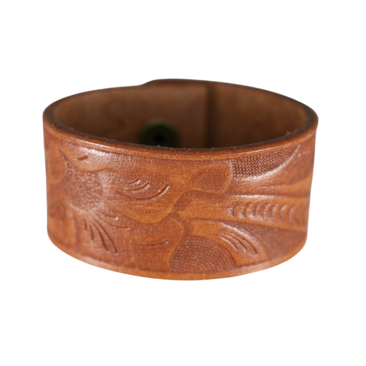 Repurposed tan leather cuff bracelet with embossed floral tooling and a warm, worn-in finish by Kelly Horrigan Handmade.