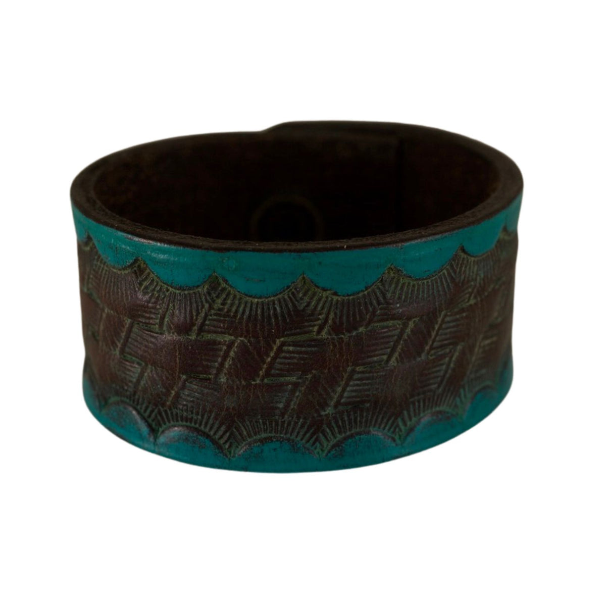 Handmade dark brown leather cuff bracelet featuring turquoise-colored accents, embossed patterns, and distressed leather.